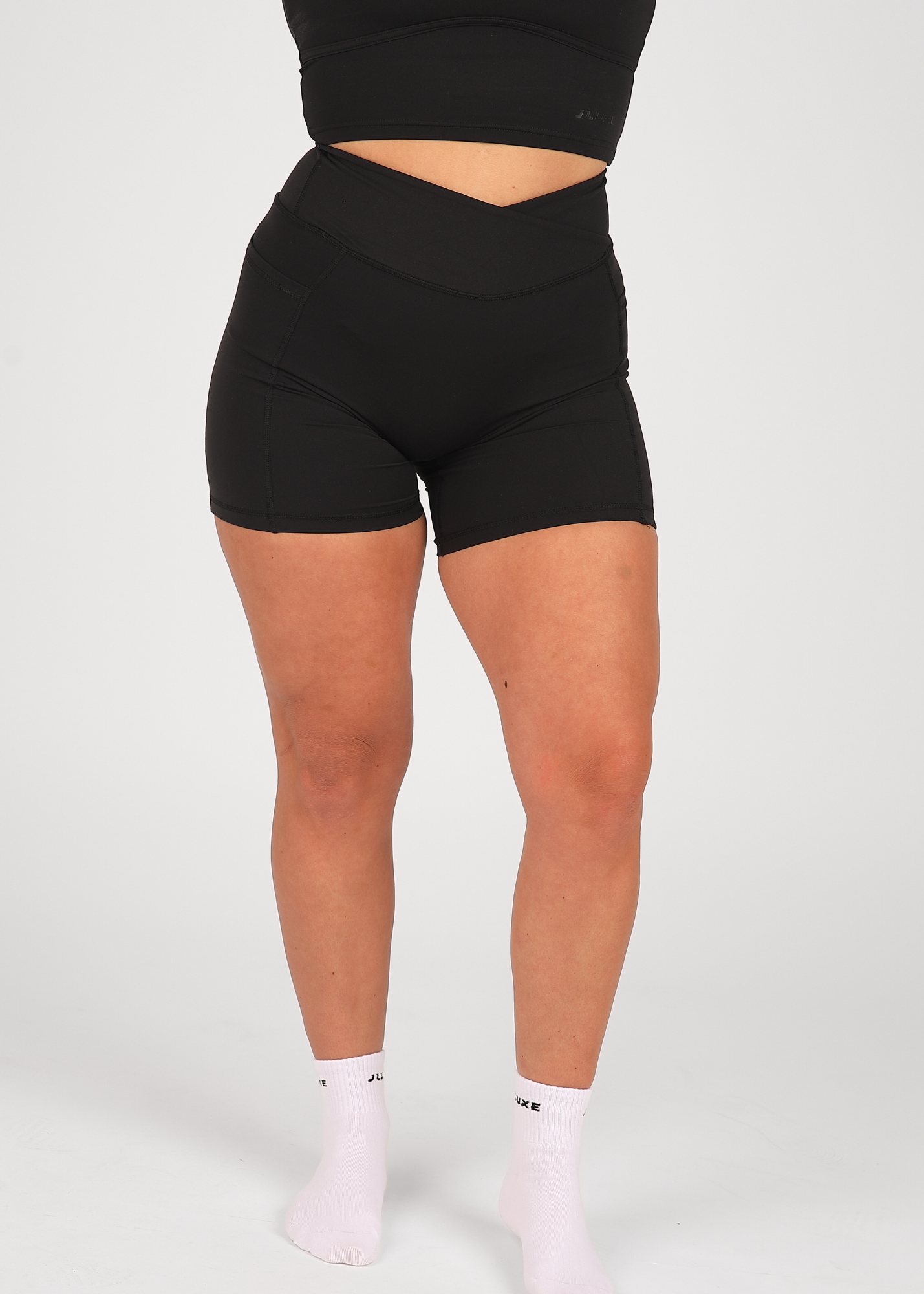 CloudLuxe Black Wrap Pocket 7" Shorts