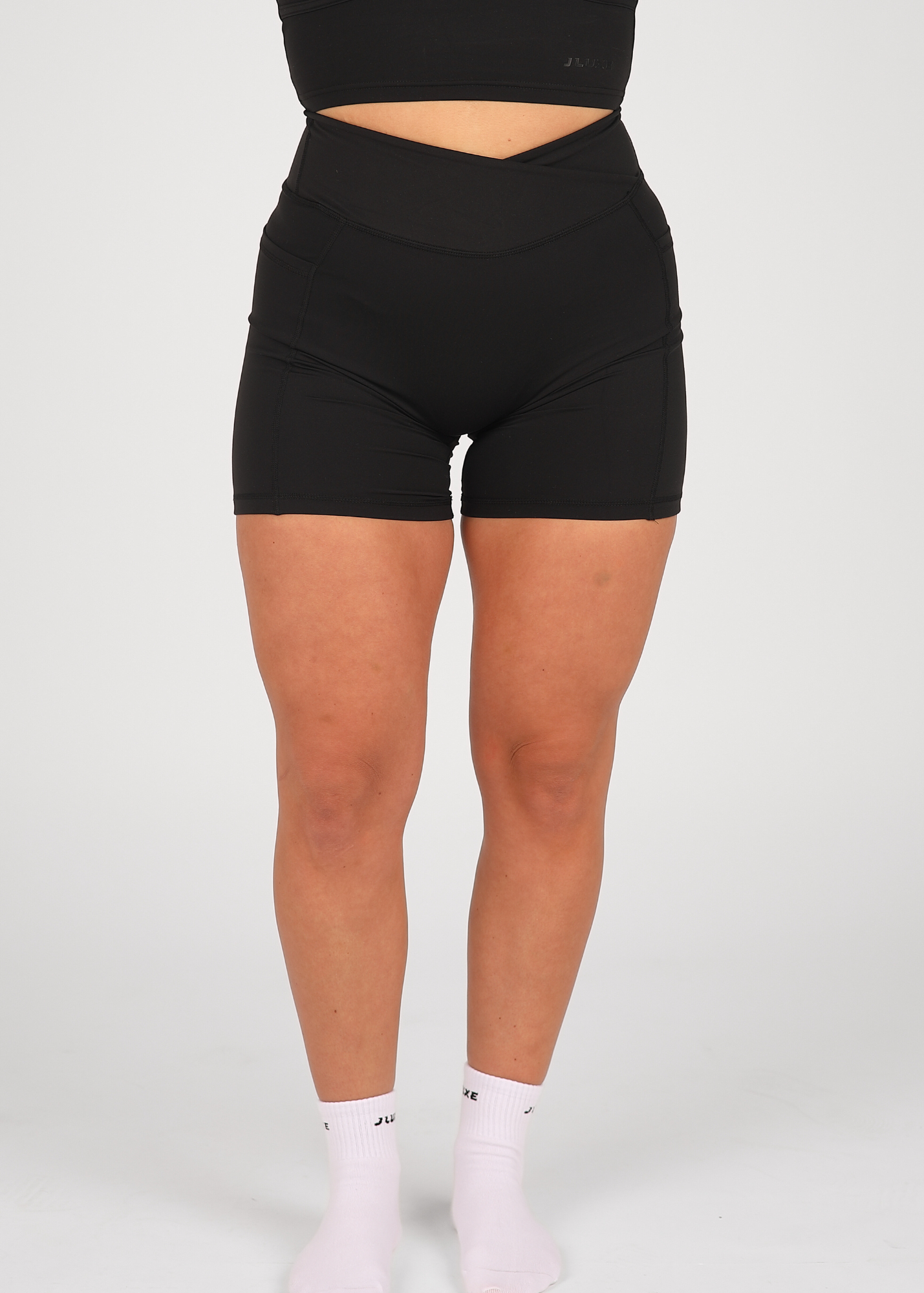 CloudLuxe Black Wrap Pocket 7" Shorts