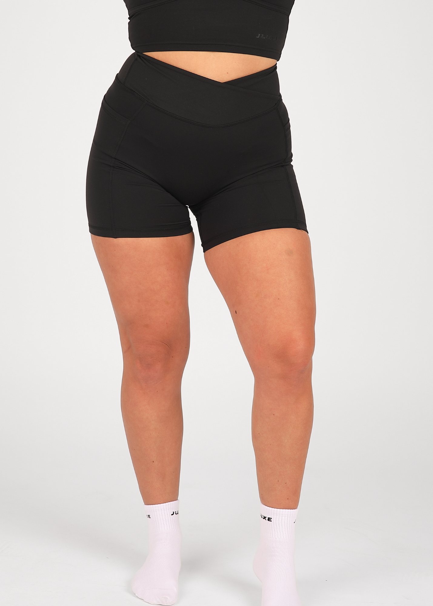 CloudLuxe Black Wrap Pocket 7" Shorts