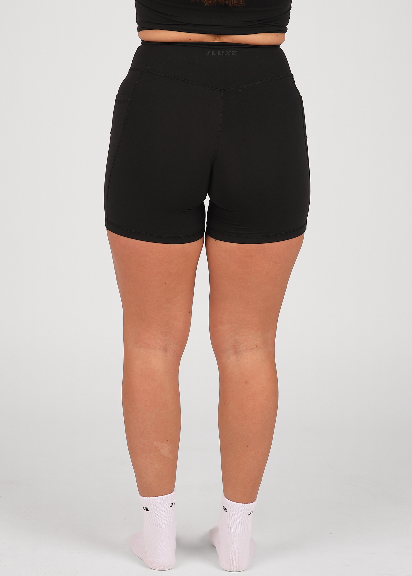 CloudLuxe Black Wrap Pocket 7" Shorts