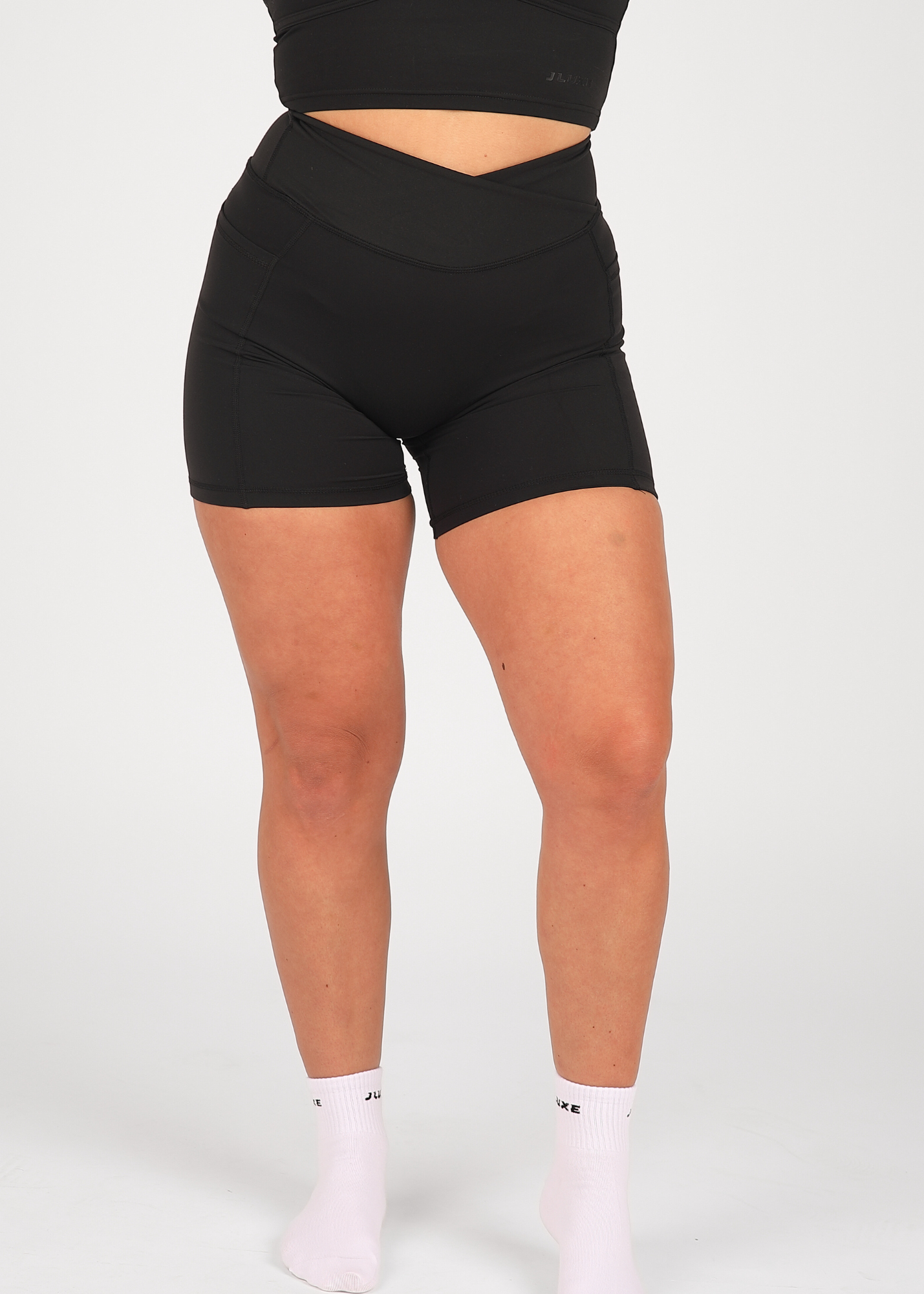 CloudLuxe Black Wrap Pocket  7" Shorts