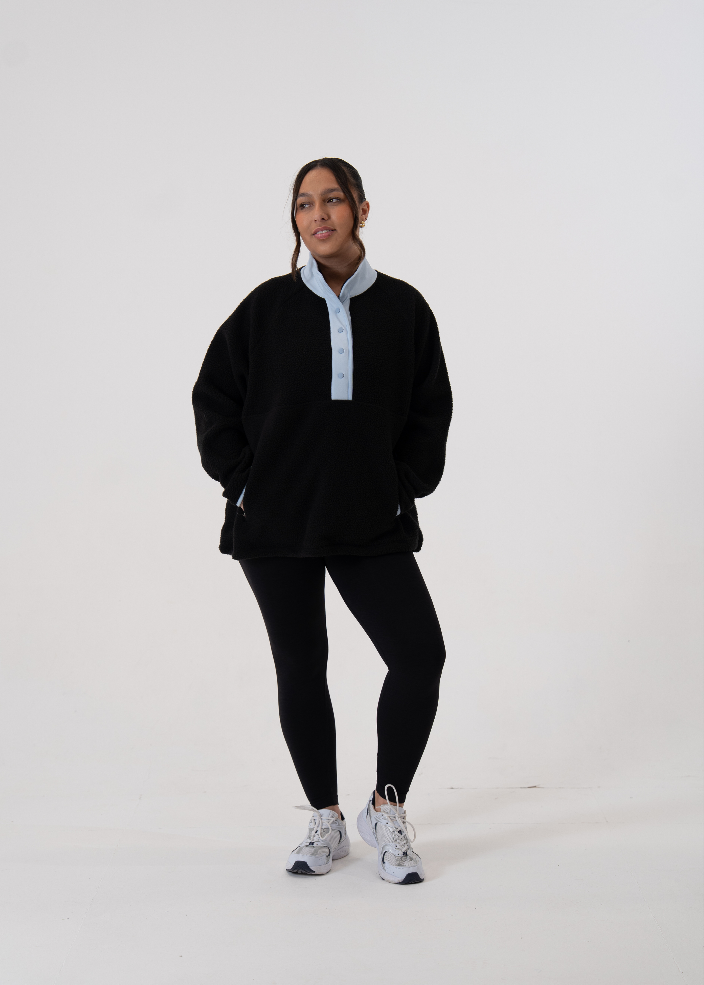 Madison is 5ft 6, Cup size 34HH, UK size 12-14 and wears an M. 
Please note the fit is oversized so we recommend taking a size down.
